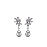 Pear shaped rosettes, made by baguette cut diamonds. 